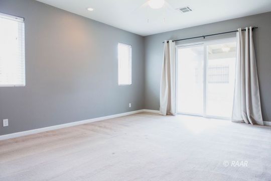 1633 South Farragut Street Ridgecrest, CA 93555 - Photo 19 of 30 an empty room with windows and closet