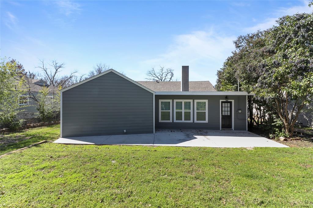 3557 Winston Road Fort Worth, TX 76109 - Photo 24 of 25 front view of a house with a yard