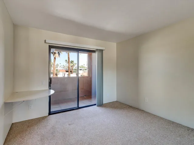 a view of empty room with floor