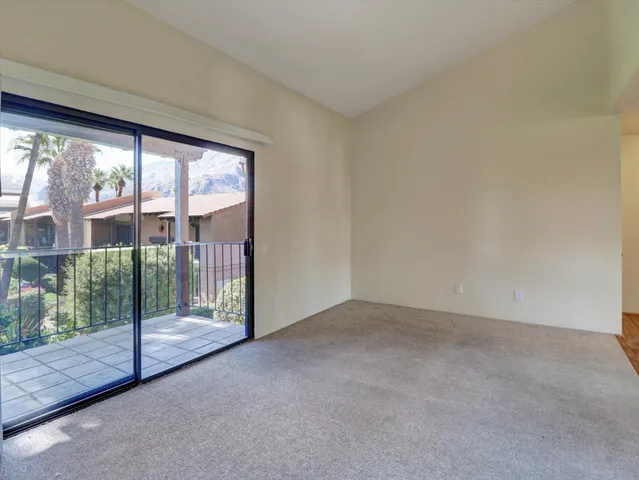 a view of a room with sliding glass door