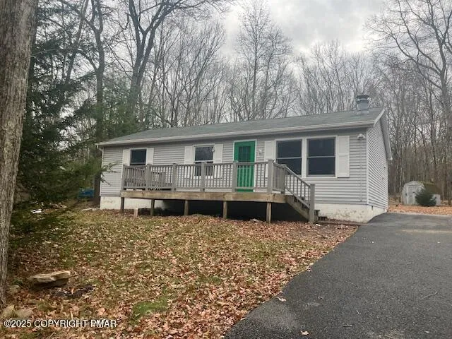 a house with trees in the background