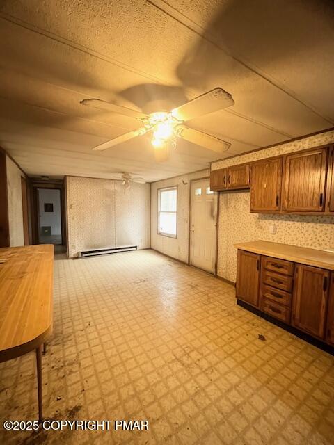 24 Indian Trail Road Jim Thorpe, PA 18229 - Photo 3 of 9 a view of a livingroom with wooden floor and kitchen