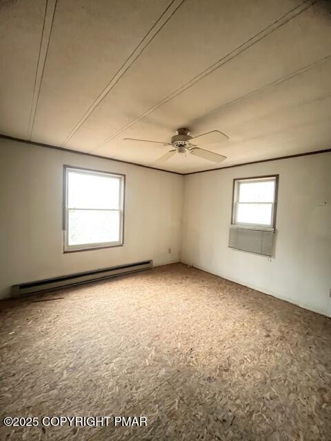 24 Indian Trail Road Jim Thorpe, PA 18229 - Photo 5 of 9 an empty room with a empty space and windows