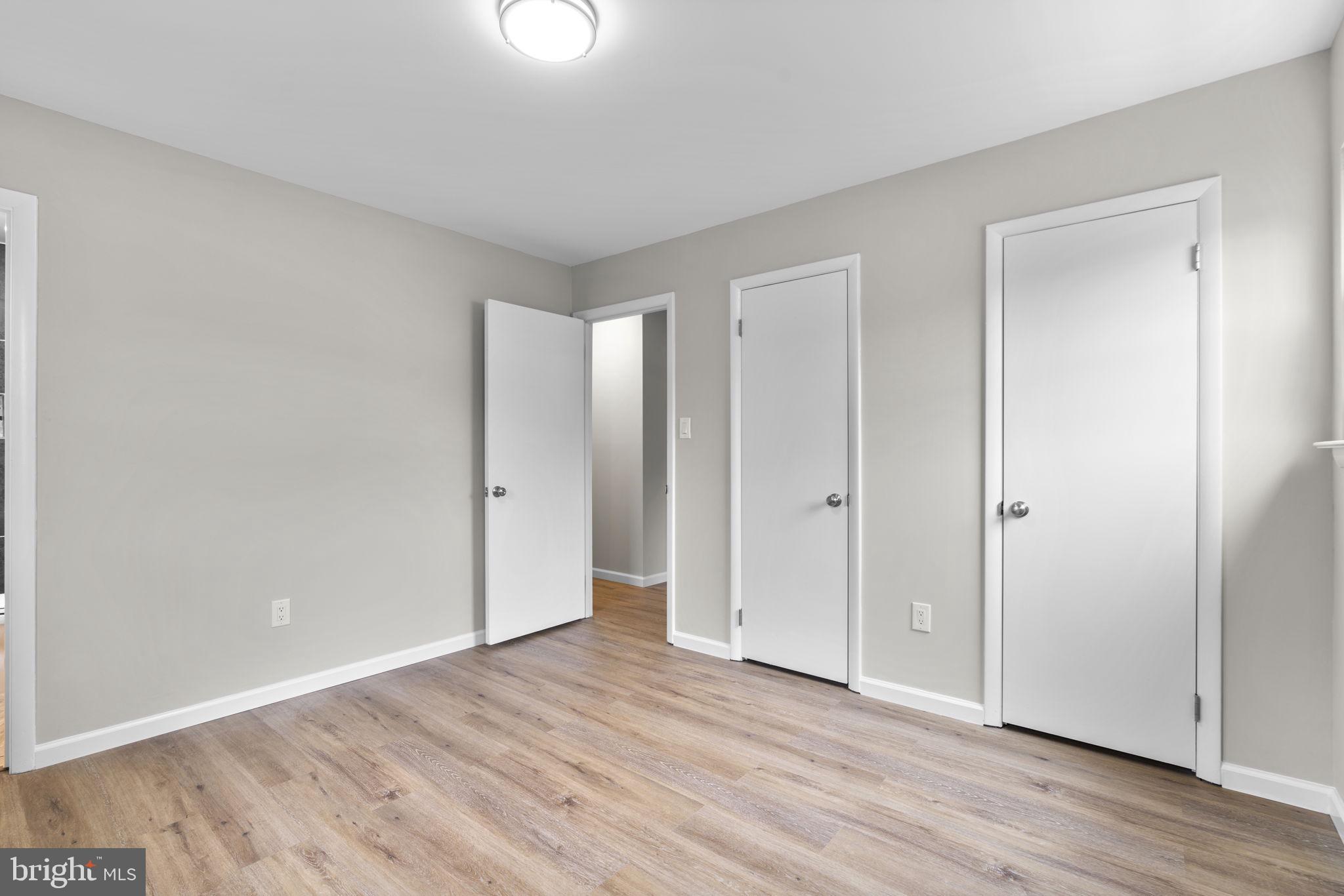 24320 Log House Road Gaithersburg, MD 20882 - Photo 19 of 43 a view of an empty room and wooden floor