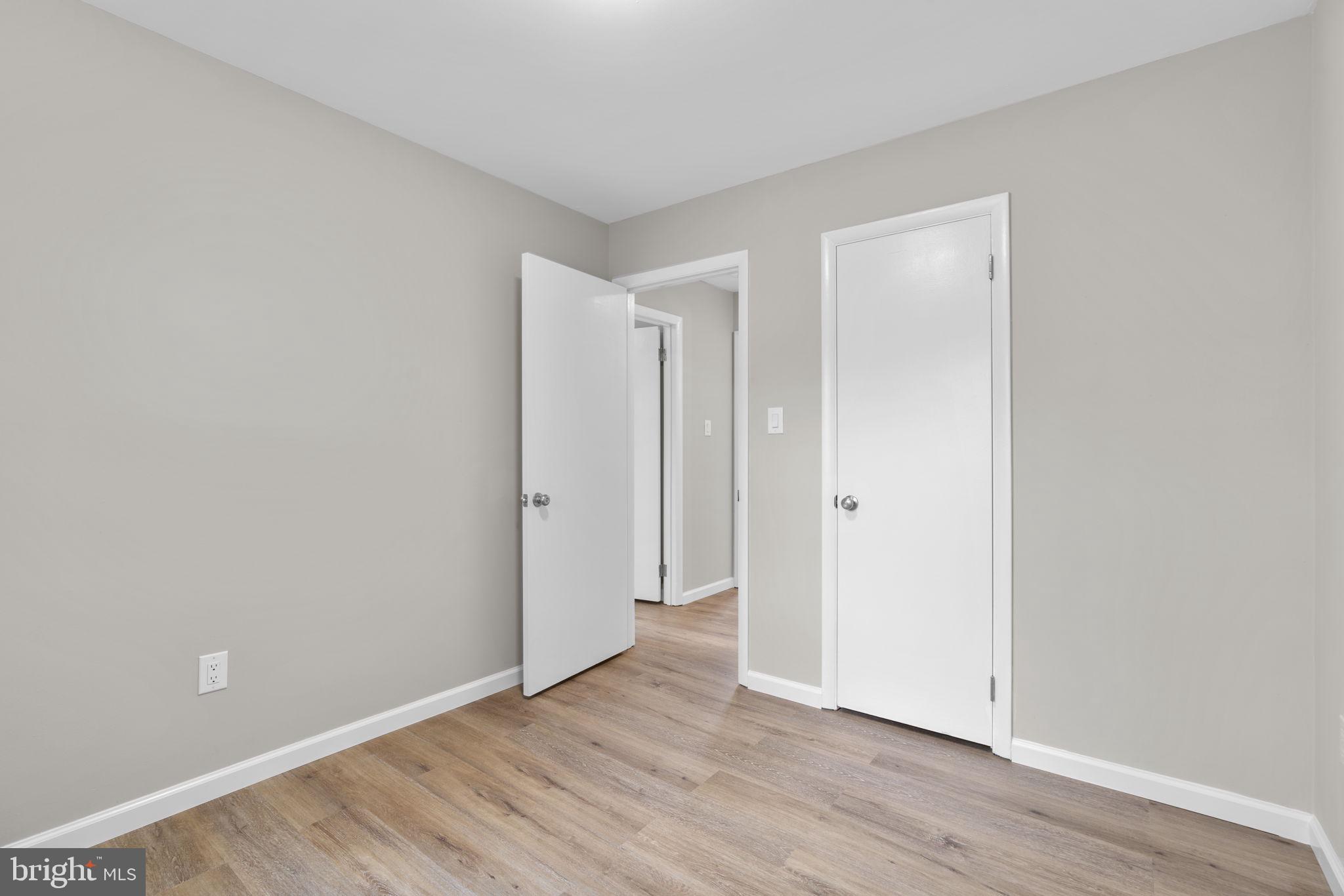 24320 Log House Road Gaithersburg, MD 20882 - Photo 24 of 43 a view of an empty room with wooden floor