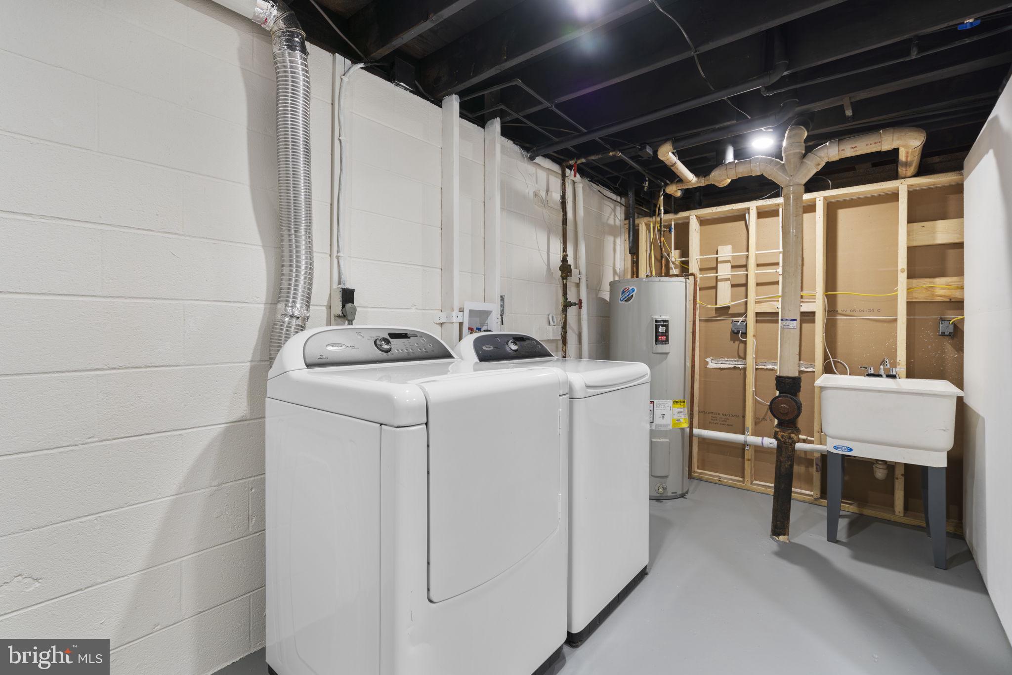 24320 Log House Road Gaithersburg, MD 20882 - Photo 35 of 43 a utility room with dryer and washer