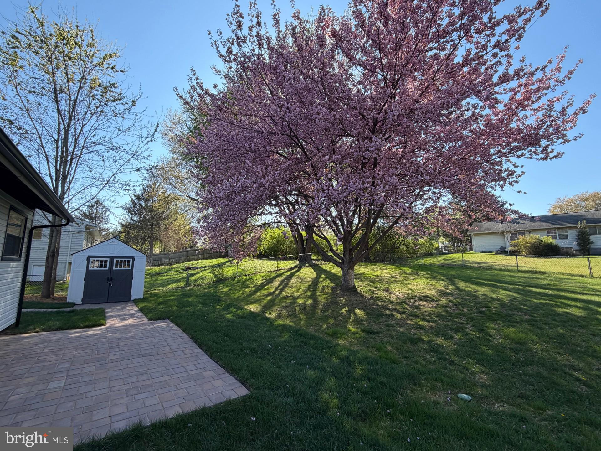 24320 Log House Road Gaithersburg, MD 20882 - Photo 39 of 43 a view of a house with a yard and tree s