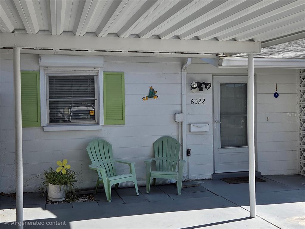6022 Lilli Way, Unit 6022 Bradenton, FL 34207 - Photo 1 of 30 a view of a entryway door front of house