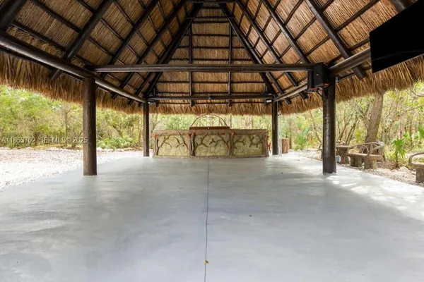 a view of a room with wooden walls