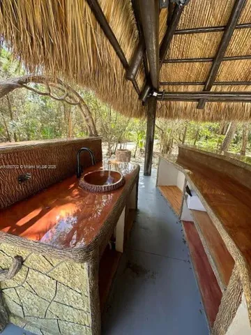 a view of a backyard of the house