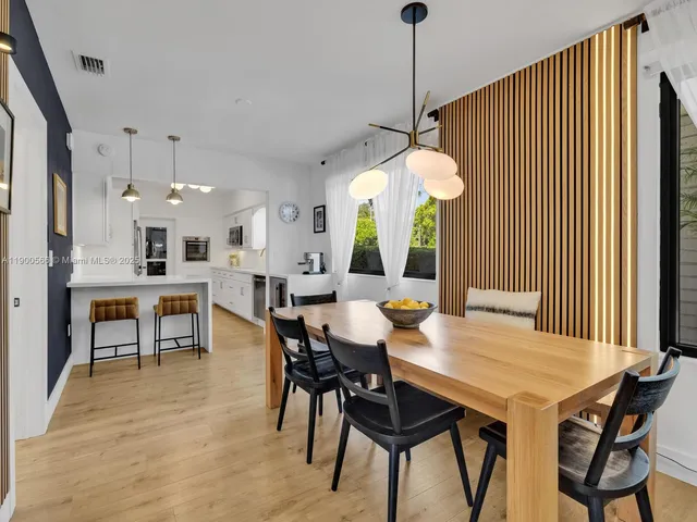 a bathroom with a sink and a shower