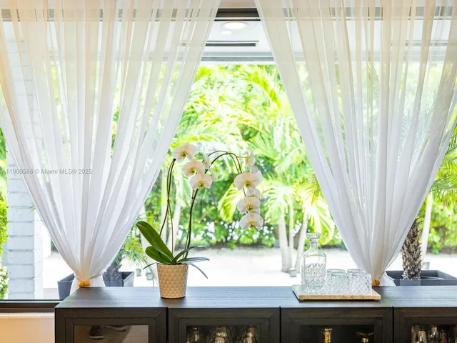 a bathroom with a granite countertop sink a toilet and bathtub
