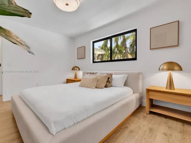 a view of a table and chairs in patio of the house