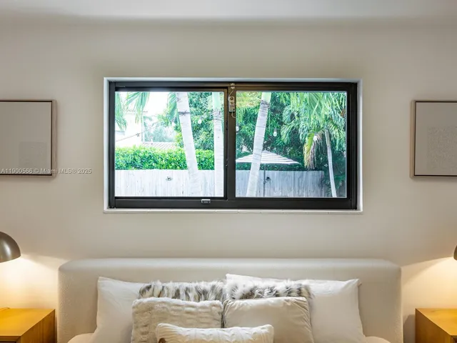 a view of a yard with furniture and a fire pit