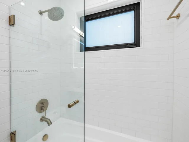 a view of a dining room with furniture wooden floor and chandelier