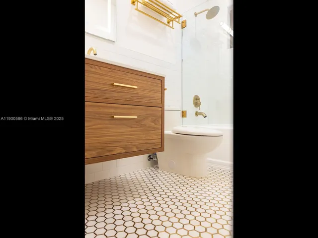 an aerial view of a house with outdoor space