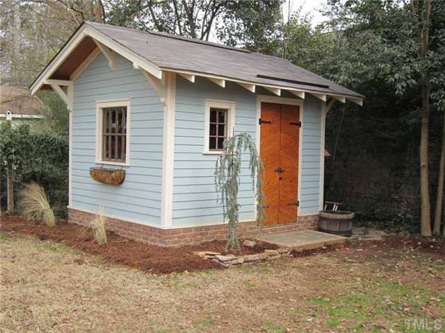 1704 Dare Street Raleigh, NC 27608 - Photo 24 of 25 Cool new custom gargen shed complinents the home. Brick foundation, Handmade Doors.