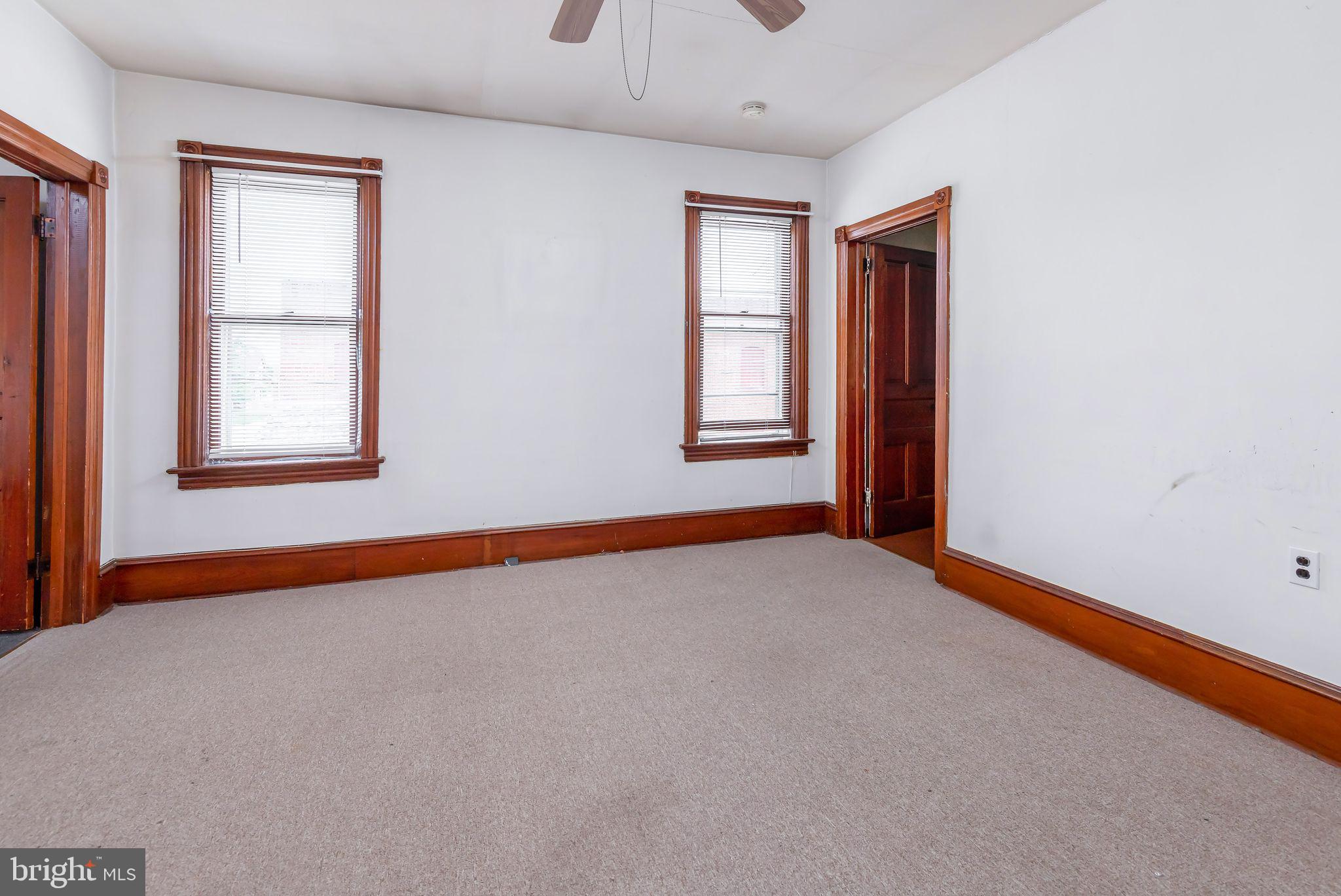 504 West Broad Street Gibbstown, NJ 08027 - Photo 12 of 37 an empty room with windows