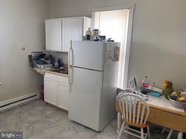 504 West Broad Street Gibbstown, NJ 08027 - Photo 20 of 37 a kitchen with refrigerator and window