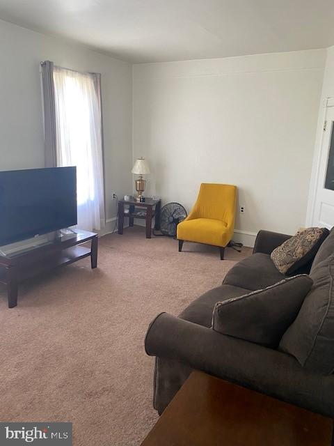504 West Broad Street Gibbstown, NJ 08027 - Photo 22 of 37 a living room with furniture and a window