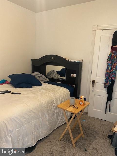504 West Broad Street Gibbstown, NJ 08027 - Photo 26 of 37 a bedroom with a bed and a chair
