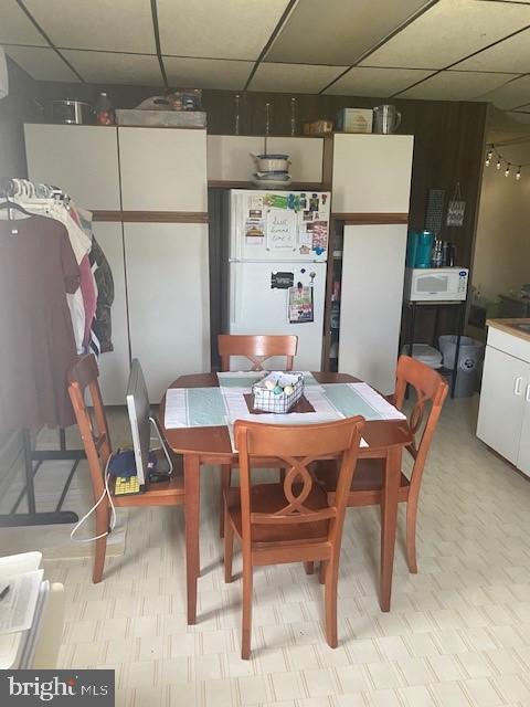 504 West Broad Street Gibbstown, NJ 08027 - Photo 27 of 37 a dining room with a wooden table and chairs