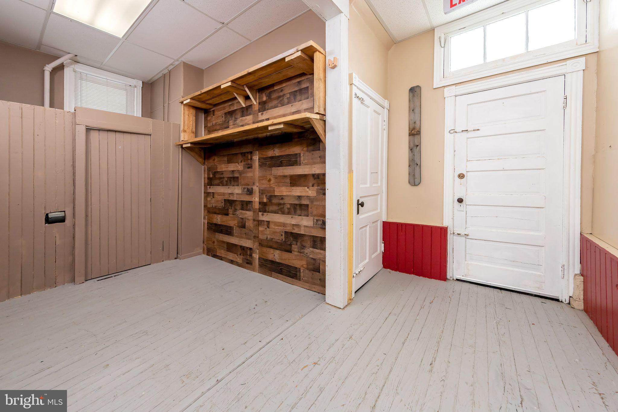 504 West Broad Street Gibbstown, NJ 08027 - Photo 5 of 37 a view of an empty room and fire place