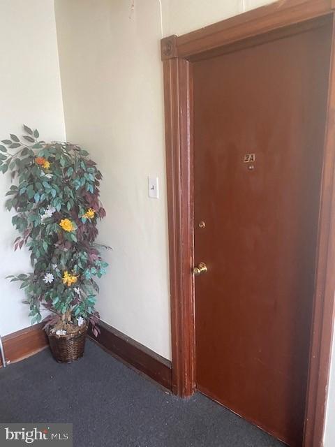 504 West Broad Street Gibbstown, NJ 08027 - Photo 7 of 37 an empty room with a wooden door