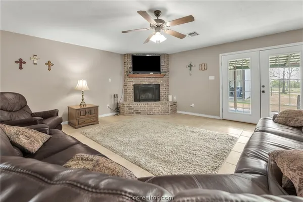 a kitchen with stainless steel appliances granite countertop a stove sink and cabinets