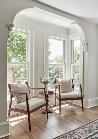 a living room with furniture and a window