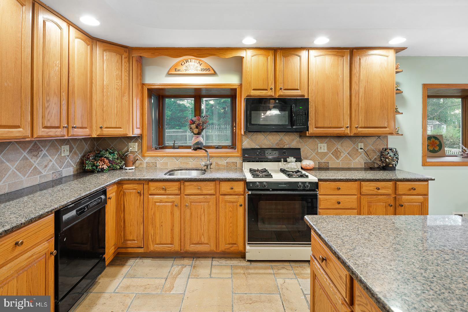 10 Bayberry Road Ewing, NJ 08618 - Photo 7 of 29 Granite countertops and tile backsplash.