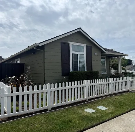 a view of a house with a street