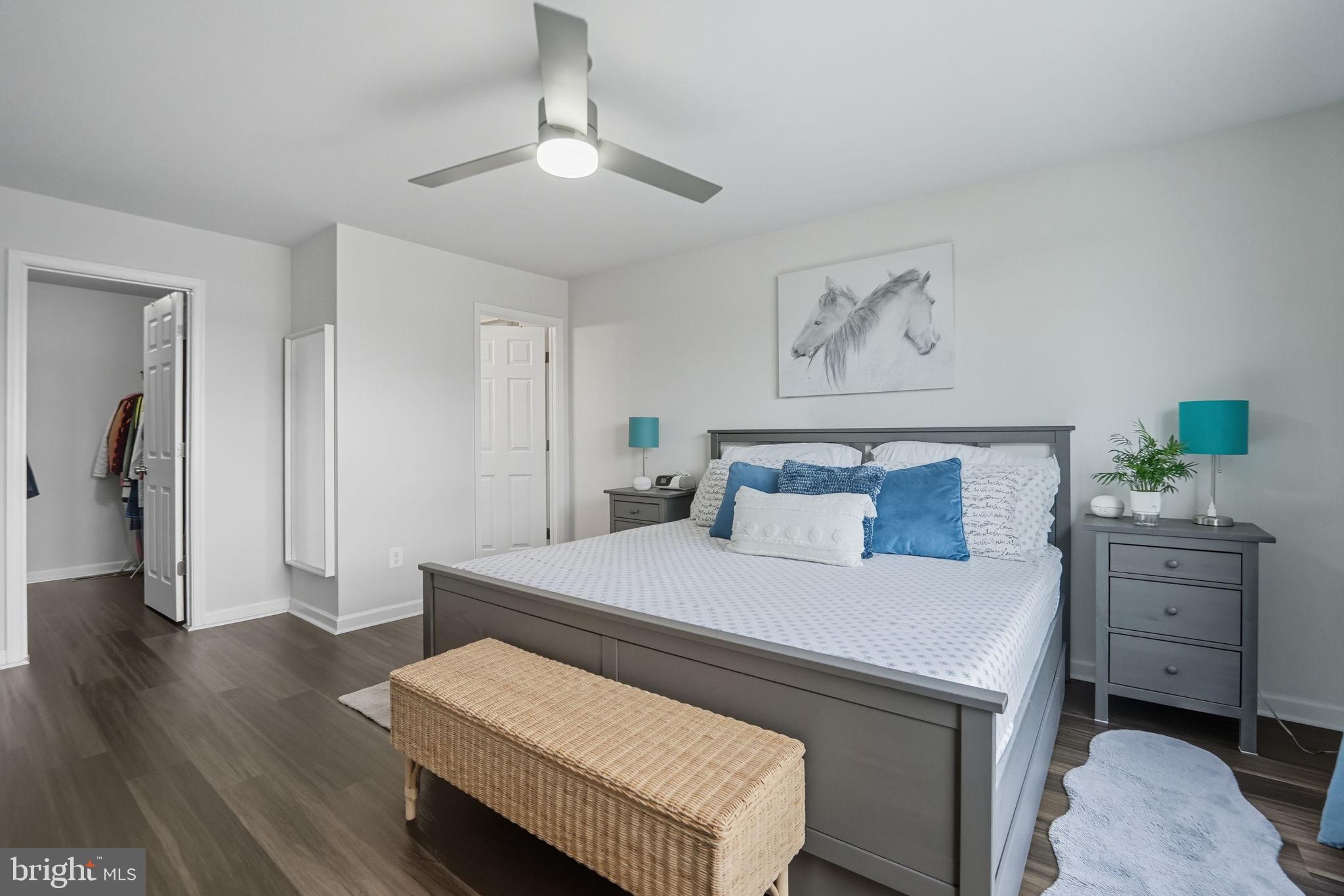 119 Interlace Way Stephenson, VA 22656 - Photo 11 of 22 a bedroom with a bed and a chandelier