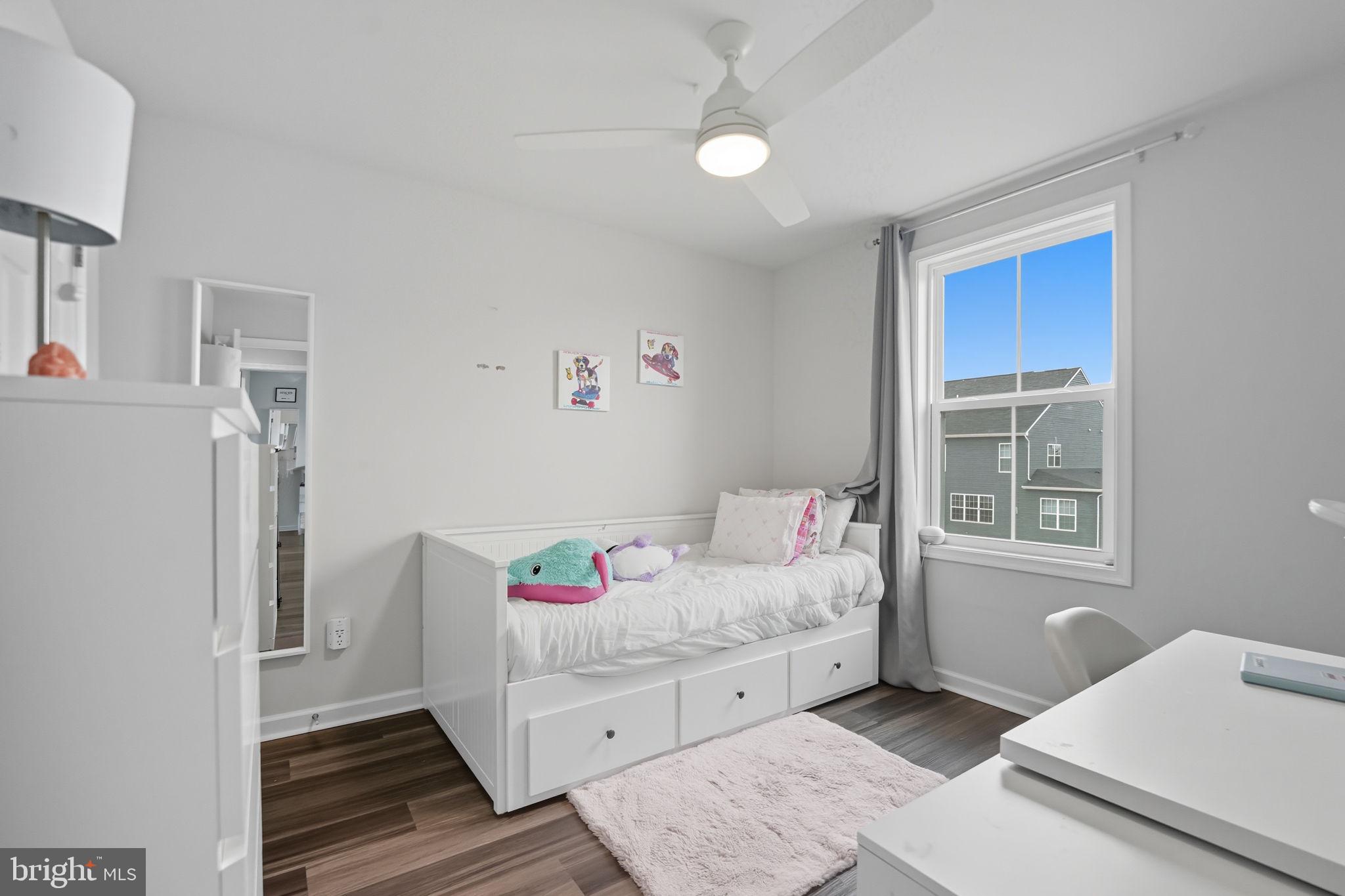 119 Interlace Way Stephenson, VA 22656 - Photo 13 of 22 a bedroom with a bed and a window