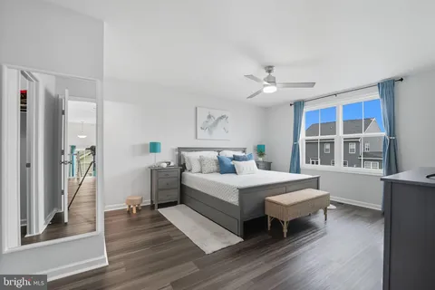 a bed room with a bed and a window