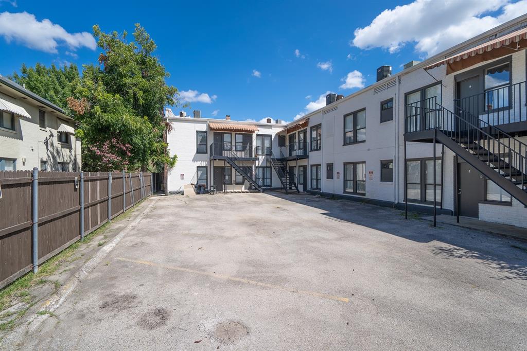 5305 Reiger Avenue, Unit 2 Dallas, TX 75214 - Photo 13 of 15 a view of a house with a wooden fence