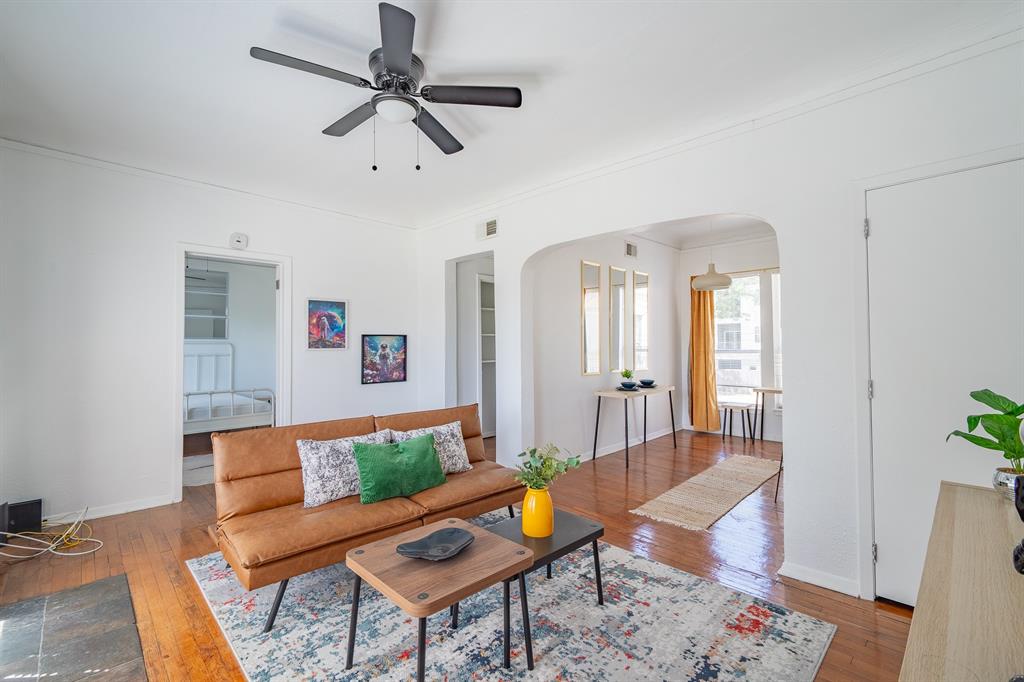 5305 Reiger Avenue, Unit 2 Dallas, TX 75214 - Photo 5 of 15 a living room with furniture and a rug