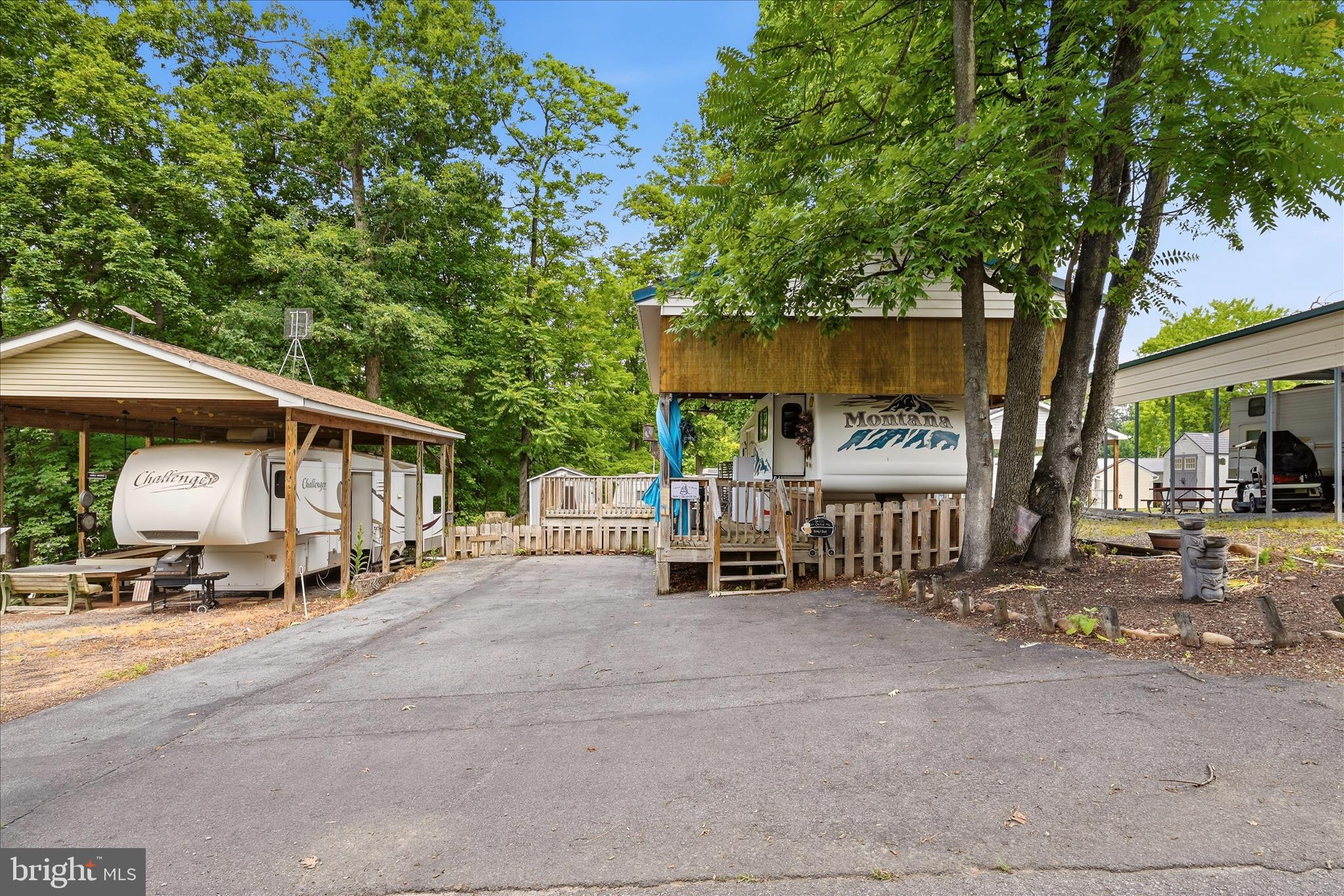 Lot 20 Hot Dog Road Falling Waters, WV 25419 - Photo 3 of 26 a view of a parked cars in front of a house