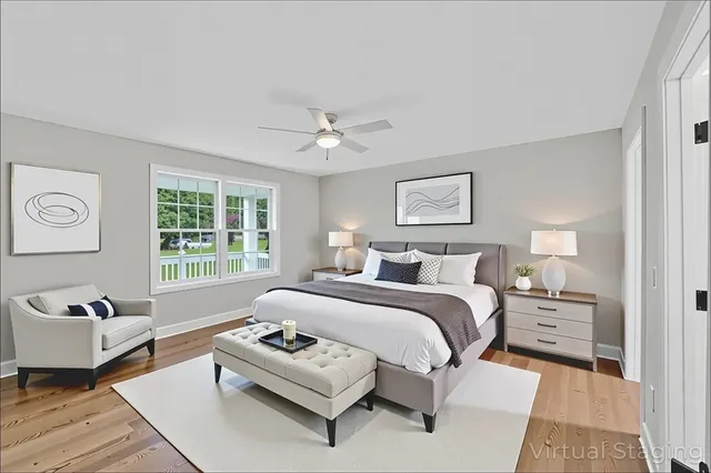 a spacious bedroom with a bed and a couch