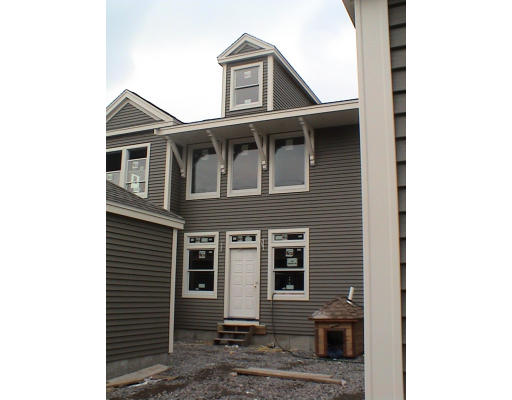 52 Crescent Road, Unit 52 Needham, MA 02494 - Photo 5 of 5 a front view of a house with a yard