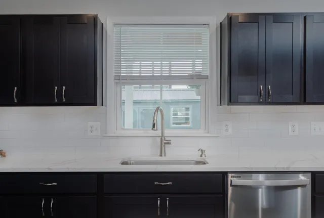 a view of workspace with wooden floor windows