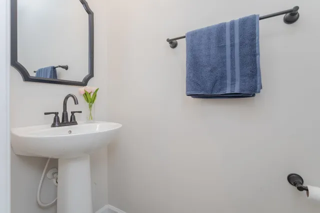 a view of a bedroom with a bed and closet