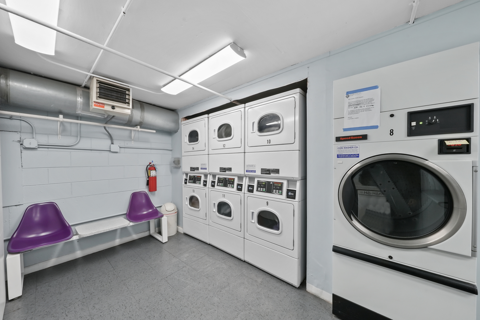 3110 North Sheridan Road, Unit 1207 Chicago, IL 60657 - Photo 23 of 32 a utility room with multiple dryer and washer