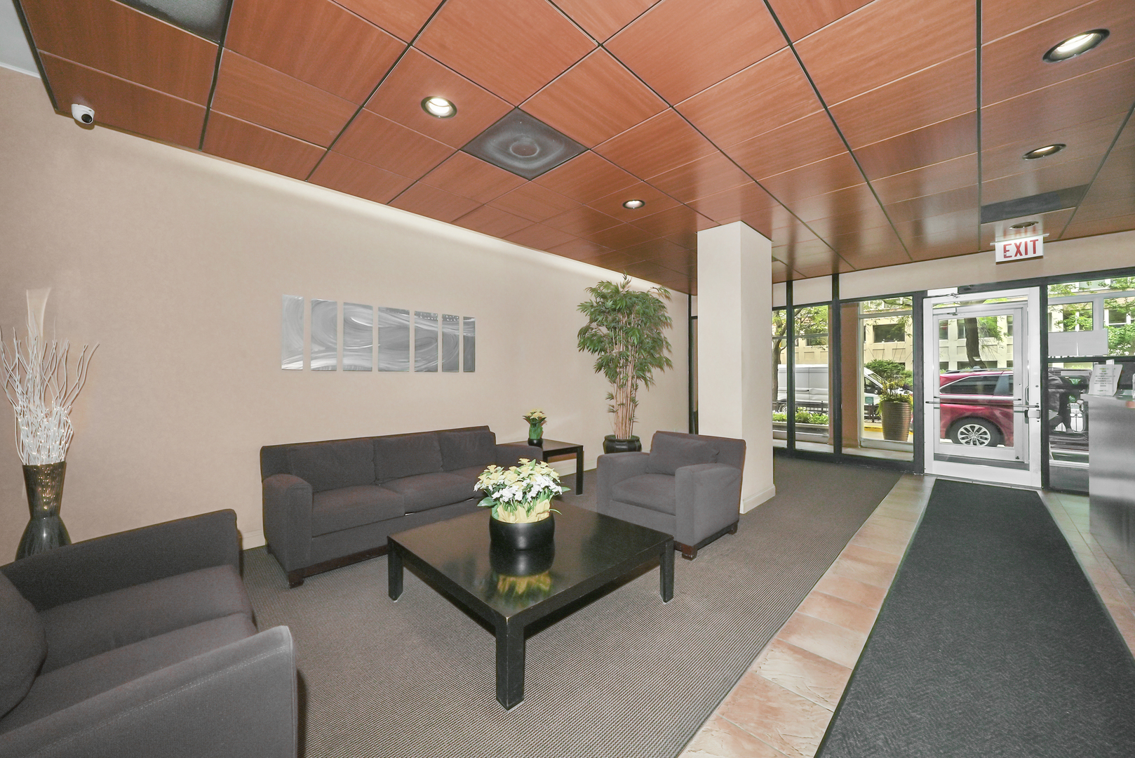 3110 North Sheridan Road, Unit 1207 Chicago, IL 60657 - Photo 7 of 32 a living room with furniture and a large window