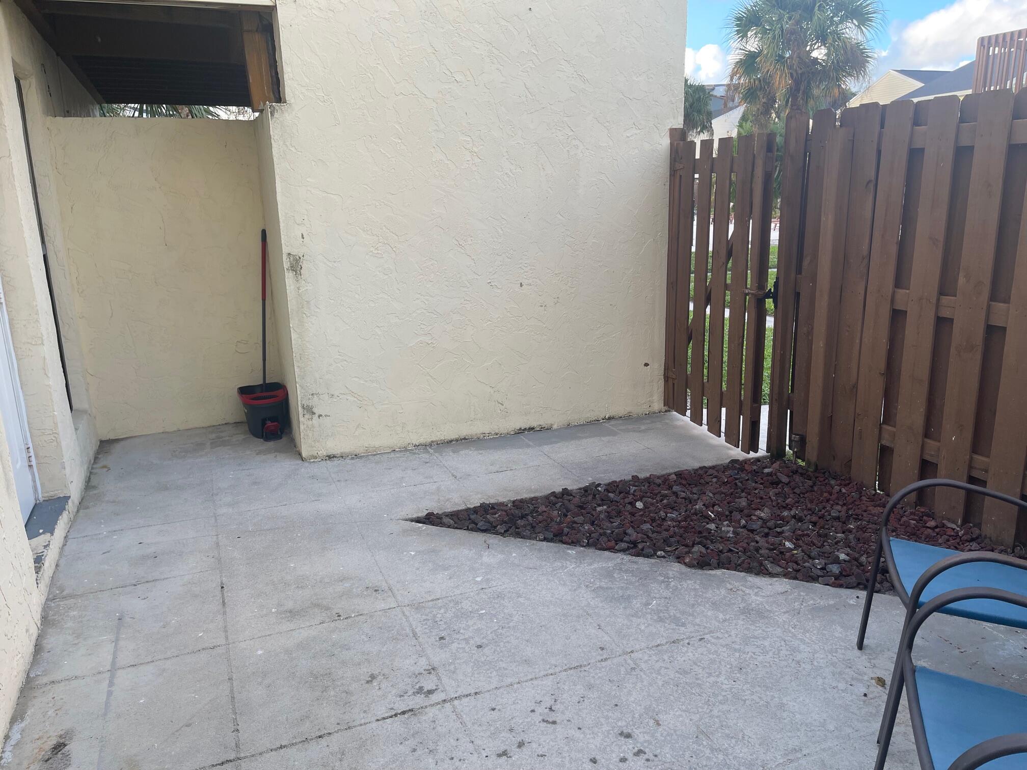 641 Executive Center Drive, Unit P105 West Palm Beach, FL 33401 - Photo 14 of 21 a view of a room with wooden walls