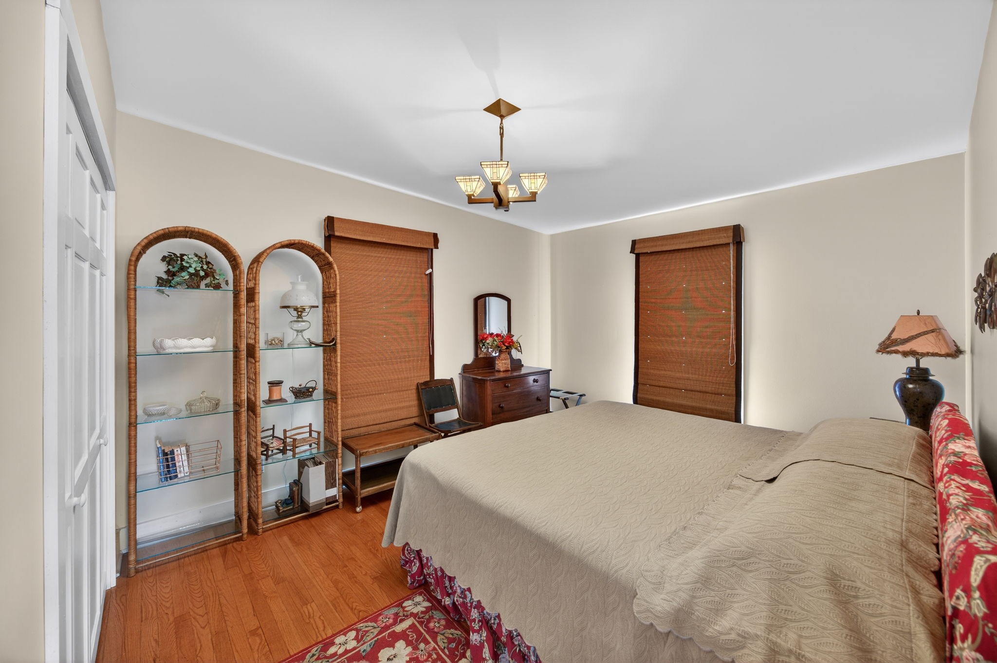 1385 Mitchell Street Celina, TN 38551 - Photo 13 of 35 a bedroom with a bed and a chandelier