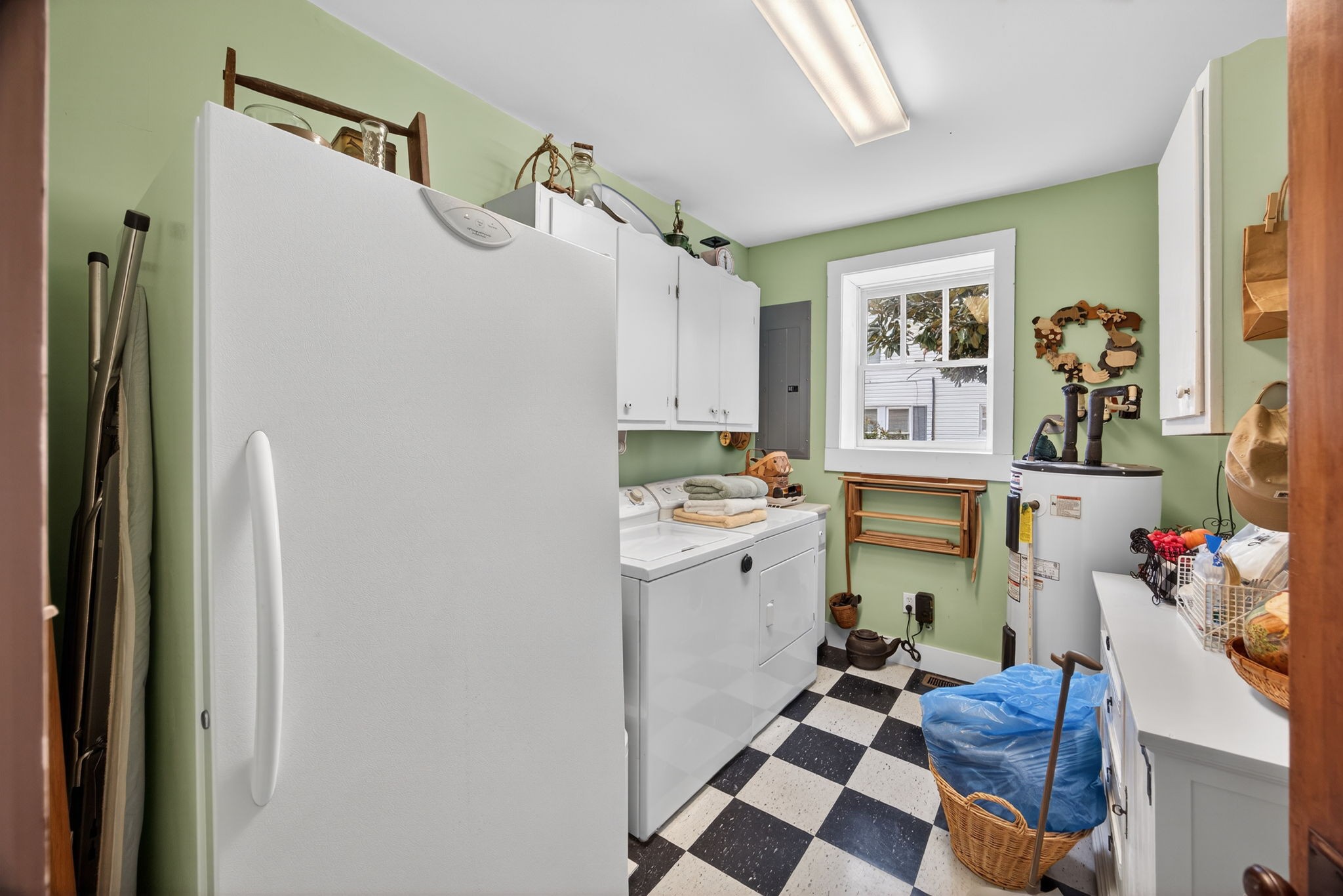 1385 Mitchell Street Celina, TN 38551 - Photo 18 of 35 a kitchen with a refrigerator and a stove