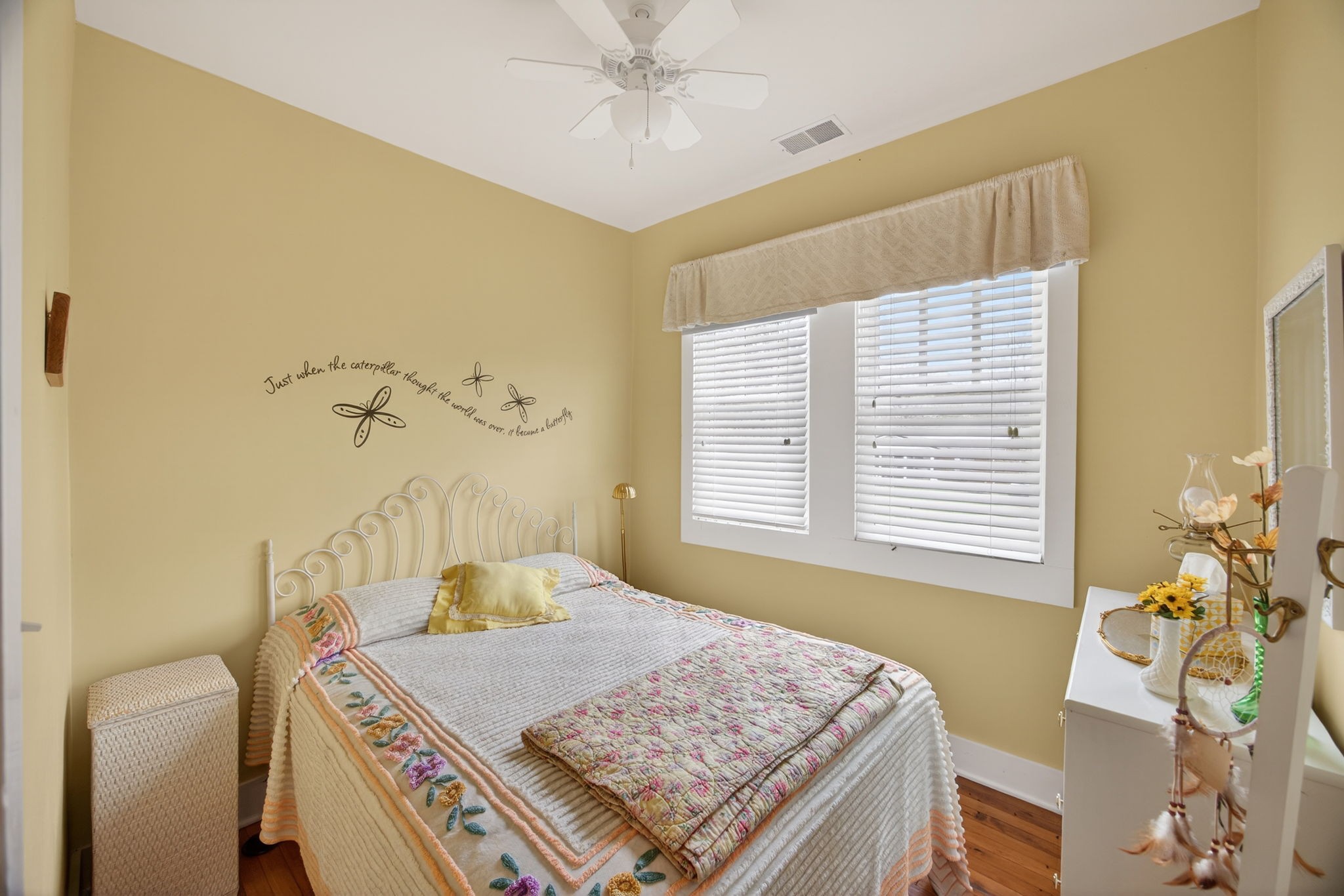 1385 Mitchell Street Celina, TN 38551 - Photo 19 of 35 a bedroom with a bed and chandelier