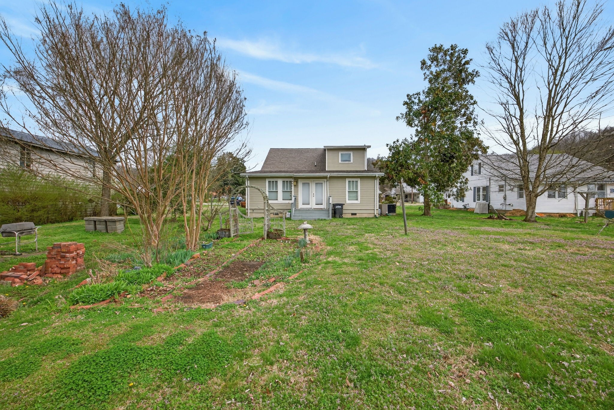 1385 Mitchell Street Celina, TN 38551 - Photo 27 of 35 a view of a house with a yard