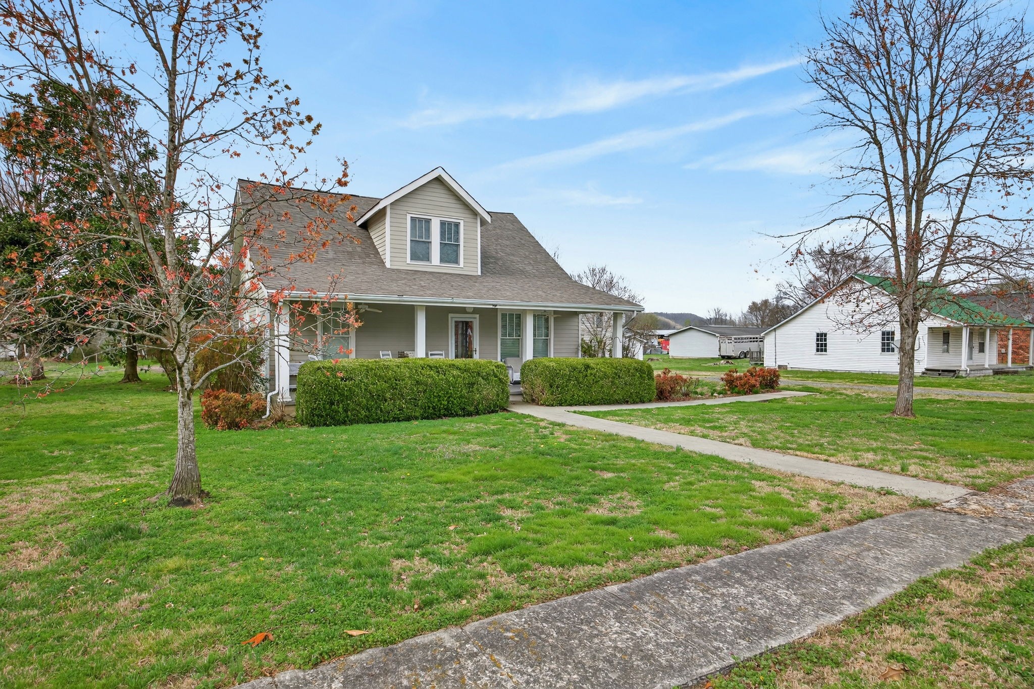 1385 Mitchell Street Celina, TN 38551 - Photo 28 of 35 a front view of a house with garden